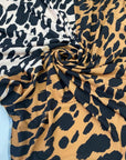 Very soft and stretch jersey with animal print in the shades of ochre and beige. Flowy and not transparent, ideal for dresses, skirts and t-shirts. High-quality deadstock collected in Stock from a Maison de Couture in Italy.