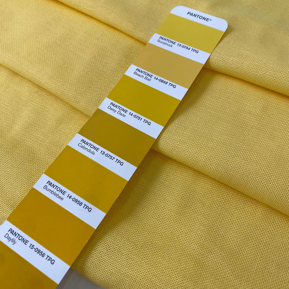 Pure cotton in sun struck yellow, slightly heavy with a rough, linen-like texture. Perfect for dresses, jackets, or skirts. High-quality deadstock collected in Stock from a Maison de Couture in Italy.