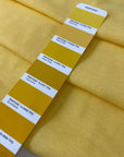 Pure cotton in sun struck yellow, slightly heavy with a rough, linen-like texture. Perfect for dresses, jackets, or skirts. High-quality deadstock collected in Stock from a Maison de Couture in Italy.