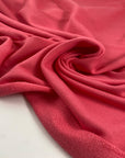 Pure cotton sweatshirt in pink color reference Strawberry Pink. Very soft and light, ideal for trousers, sweatshirts, dresses, and skirts. High-quality deadstock collected in Stock from a Maison de Couture in Italy.