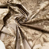 Stiff viscose and polyester taffeta printed with a jungle leaf design in sand and beige shades. Adds volume and holds shape, ideal for skirts, trench coats, and dresses. High-quality deadstock collected in Stock from a Maison de Couture in Italy. Stiff viscose and polyester taffeta printed with a jungle leaf design in sand and beige shades. Adds volume and holds shape, ideal for skirts, trench coats, and dresses. High-quality deadstock collected in Stock from a Maison de Couture in Italy.
