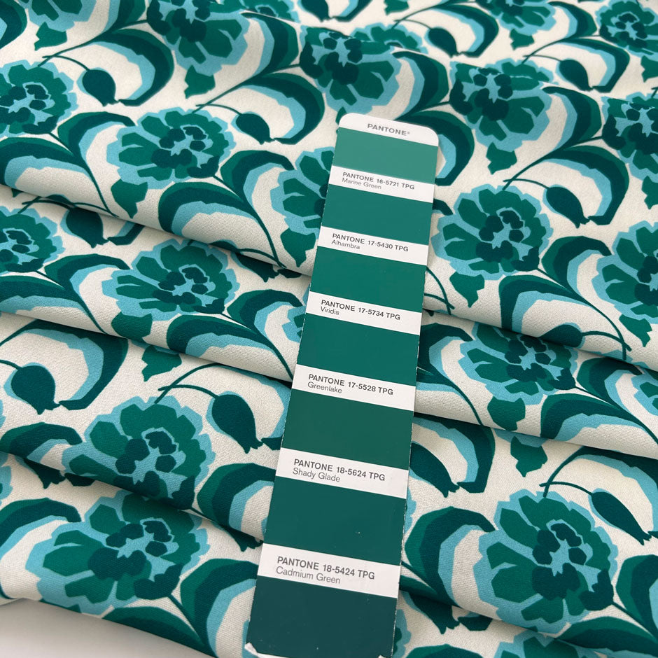 Printed Polyester With A Green And Blue Flower Design