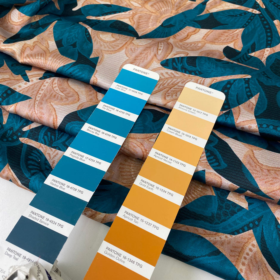 Soft, flowy polyester satin with floral design in otanium and Elmo cream. Not transparent, ideal for dresses, skirts, blouses, and shirting. High-quality deadstock collected in Stock from a Maison de Couture in Italy.