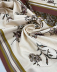 Cotton and elastane with beautiful floral design in panels. Each one is around 70 cm. White, ancient rows and olives green shades.
