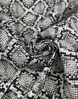 Medium Weight White Base Cotton Gabardine With Black Python Print