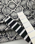 Medium Weight White Base Cotton Gabardine With Black Python Print