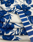 White Polyester With A Blue Floral Print