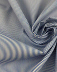 Cotton Gabardine With A Striped Print