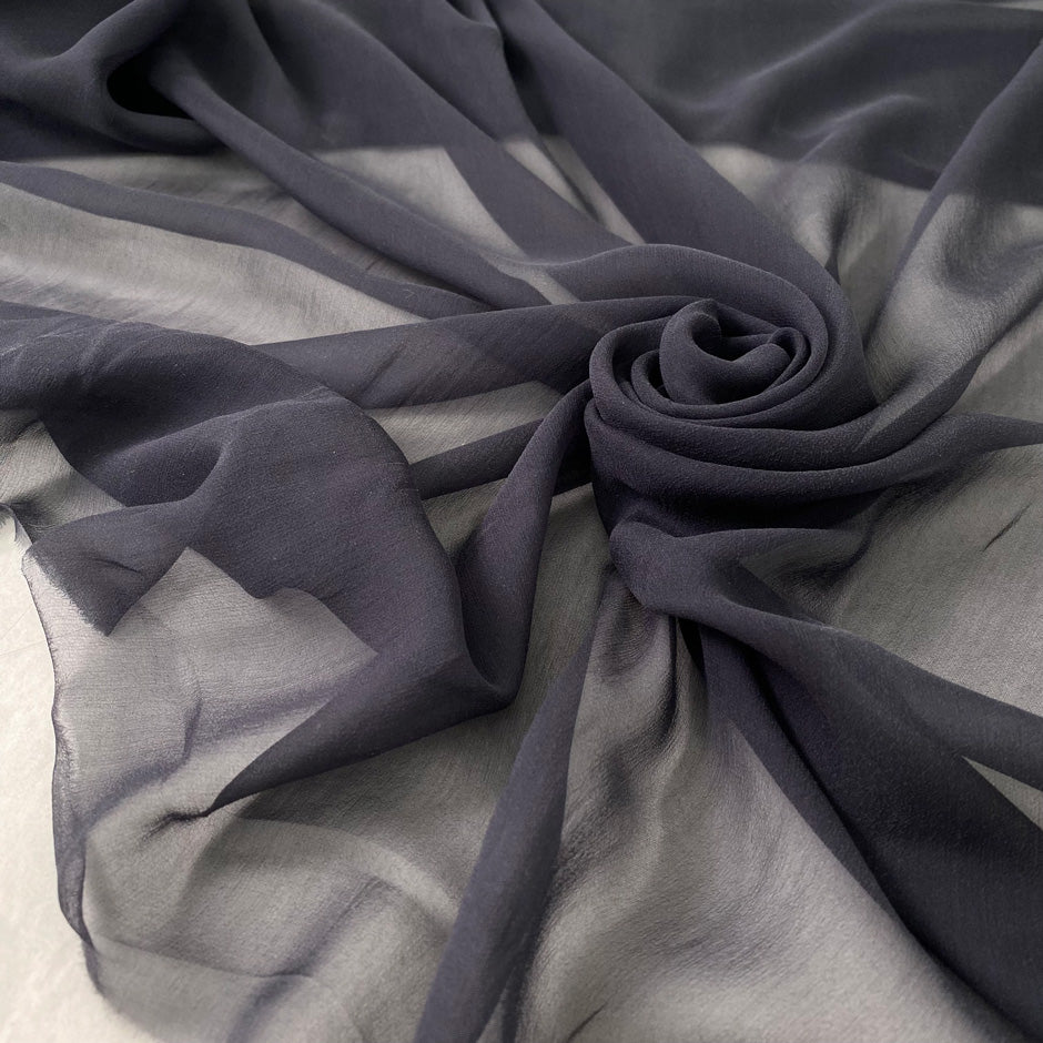 Pure silk chiffon in dark gray, color reference iron gate, very soft, light, and flowy with transparency. Ideal for skirts, skirts, and dresses. High-quality deadstock fabric by the meter collected in Stock from a Maison de Couture in Italy.