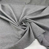 Milano stitch of soft and compact viscose-polyamide blend with grey melange weave. High quality deadstock fabric. Milano stitch of soft and compact viscose-polyamide blend with grey melange weave. High quality deadstock fabric.