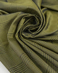 Soft tafta in polyester in olive green with prince of Wales design. High-quality deadstock fabric collected in Stock from a Maison de Couture in Italy.