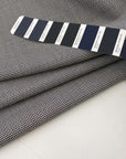 Soft and grey wool jacquard. High quality deadstock fabric.