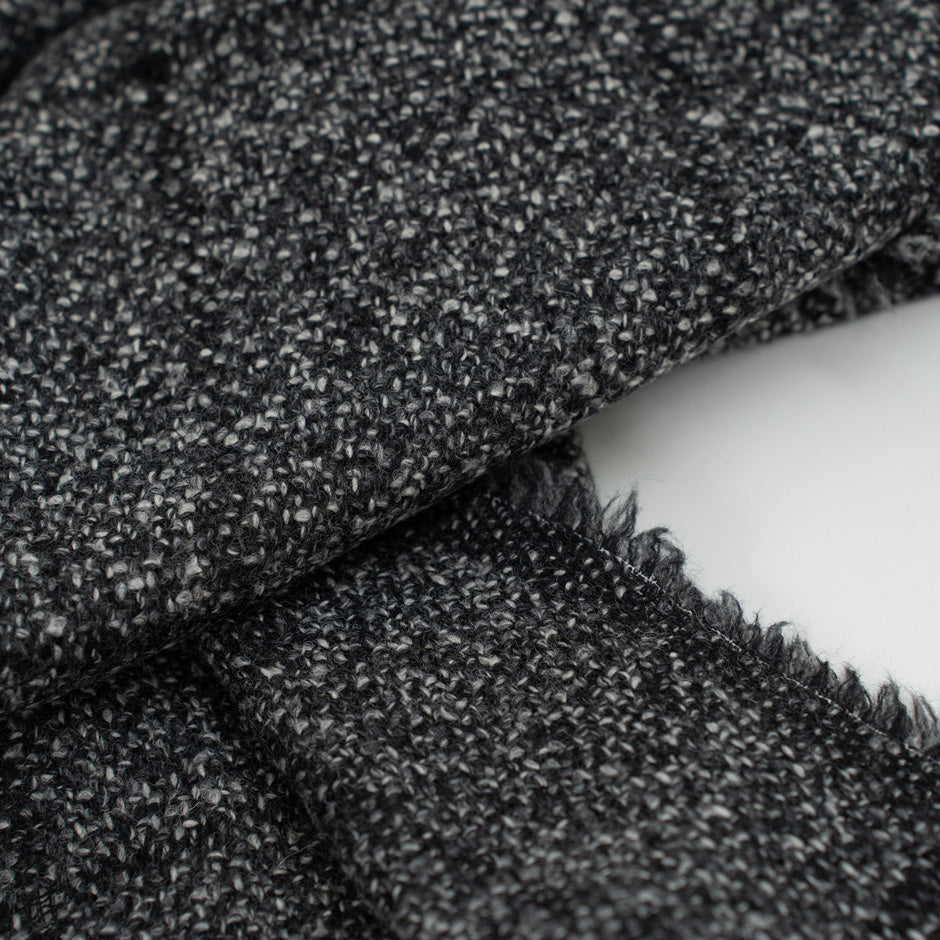 Mixed melange squared wool and nylon fabric. It is heavy and structured. High-quality deadstock fabric collected in Stock from a Maison de Couture in Italy.