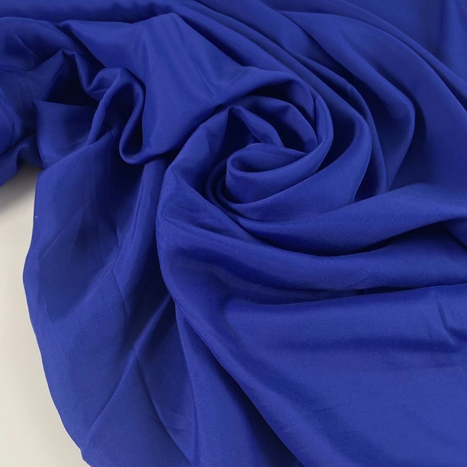 Pure viscose blue canvas fabric. High-quality deadstock fabric by the meter collected in Stock from a Maison de Couture in Italy.