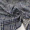 Stretch cotton-polyester blend with jacquard Prince of Wales pattern and blue and white double face. High quality deadstock fabric. Stretch cotton-polyester blend with jacquard Prince of Wales pattern and blue and white double face. High quality deadstock fabric.