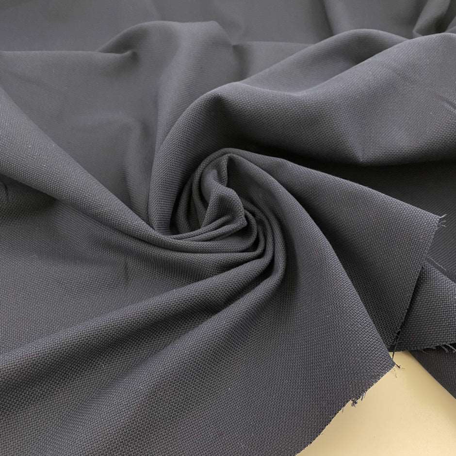 Textured cotton canvas in solid blue color. Deadstock fabric picked up in Stock from a Maison de Couture in Italy.