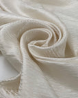 Pure silk jacquard in natural white, very soft, light, flowy, and light. High-quality deadstock fabric collected in Stock from a Maison de Couture in Italy.