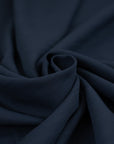 Jacquard blue wool with small lines. The fabric is falling and soft. High-quality deadstock fabric collected in Stock from a Maison de Couture in Italy.