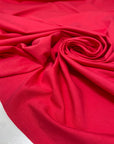 Soft and stretchy viscose and elastane blend in hot pink. Comfortable and versatile, ideal for trousers, dresses, light jackets, and skirts. High-quality deadstock collected in Stock from a Maison de Couture in Italy.
