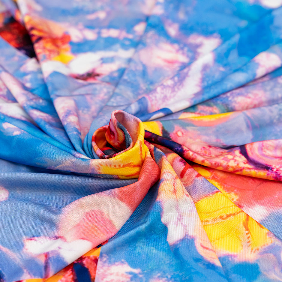 Pure viscose jersey tie dye type multicolor. Floral panel stretch fabric. High-quality deadstock collected in Stock from a Maison de Couture in Italy. 