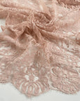 Cotton and polyester lace in skin color, reference Cream Tan. Very light and soft with a double scalloped edge. Ideal for dresses, skirts, and blouses. High-quality deadstock collected in Stock from a Maison de Couture in Italy.