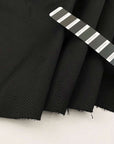 Jacquard of cotton and polyamide herringbone dyed on dyed shiny matte
