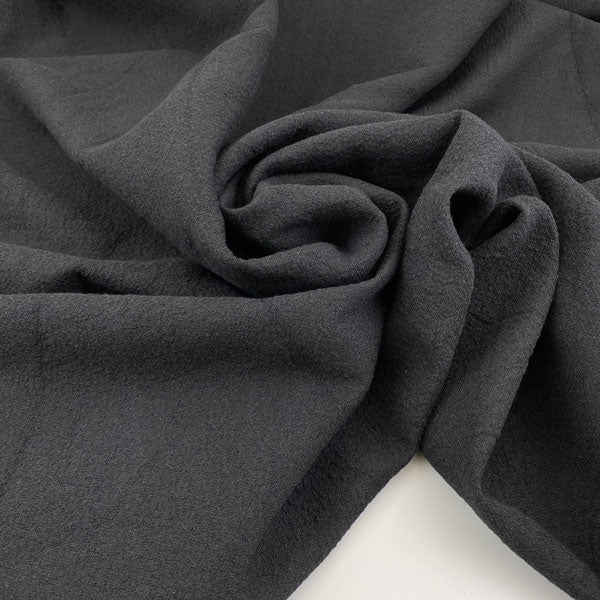 Lightweight structured soft cotton bouclé fabric