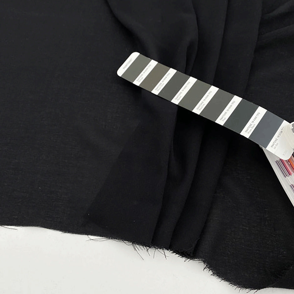 Fluid soft polyester crepe