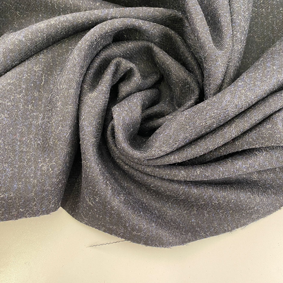 Prince of wales and Gabardine fabric. The color is dark blue. The fabric is soft. High-quality deadstock fabric collected in Stock from a Maison de Couture in Italy.