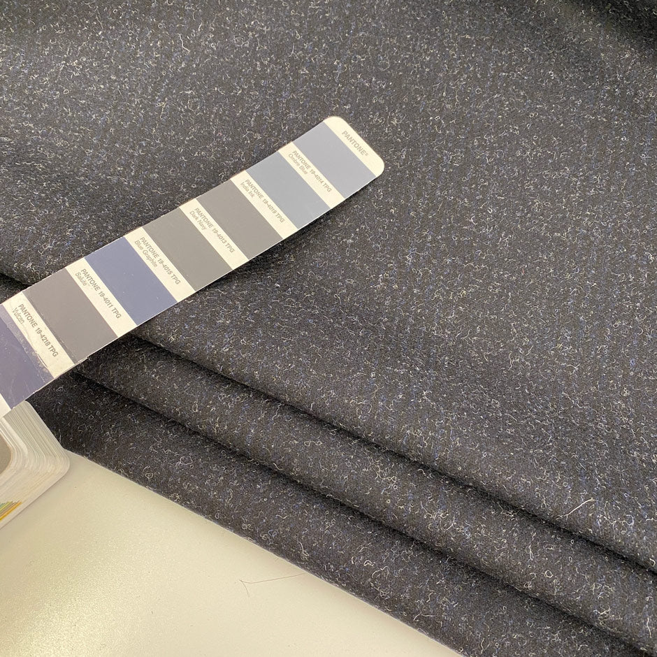 Prince of wales and Gabardine fabric. The color is dark blue. The fabric is soft. High-quality deadstock fabric collected in Stock from a Maison de Couture in Italy.
