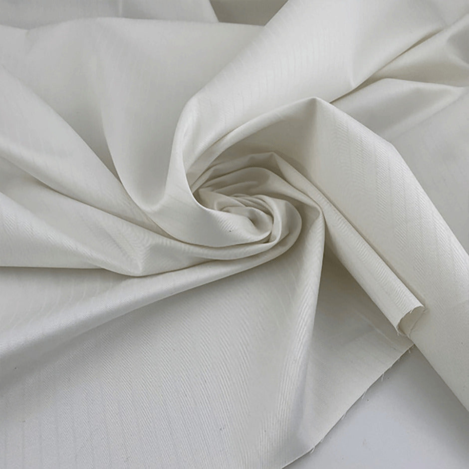 Soft pinstripe printed cotton gabardine with diago weave