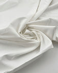 Irregularly textured soft lightweight plain cotton muslin