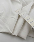 Irregularly textured soft lightweight plain cotton muslin