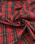 Wool and polyester plaid yarn dyed soft stretch
