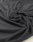 Elasticized cotton jersey worked dyed on dyed