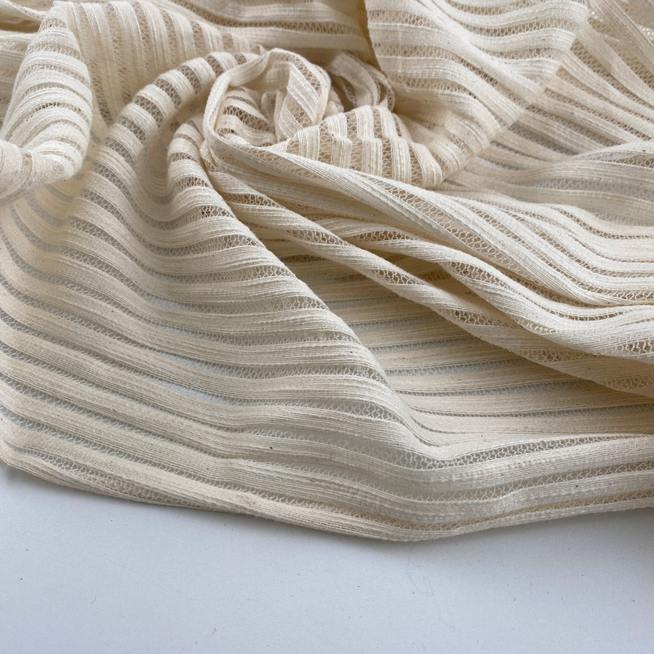 Soft transparent striped effect lace