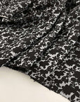 Jacquard of wool, silk and soft yarn-dyed polyester