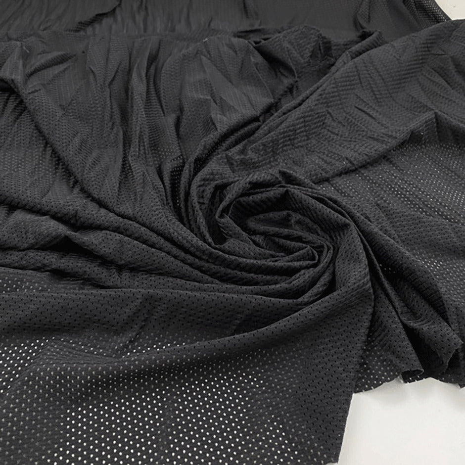 Perforated soft stretch polyester technical jersey