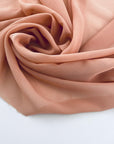 Flowing and falling transparent silk georgette in pink solid color