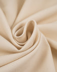 Jersey piquet viscose and poliammide punto Milano beige and heavy. High-quality deadstock fabric collected in Stock from a Maison de Couture in Italy. 