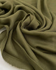 Pure viscose, very soft and light, flowy in avocado green. Ideal for shirts, skirts, dresses, and blouses. High-quality deadstock fabric by the meter collected in Stock from a Maison de Couture in Italy.