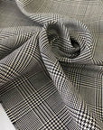 Soft and warm pure wool in a classic black and white Prince of Wales check. Perfect for light coats, jackets, or winter skirts.
High-quality deadstock collected in Stock from a Maison de Couture in Italy.