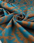 Punto Milano stretch jersey polyester, beautiful paisley design in turquoise and brown. High-quality deadstock fabric collected in Stock from a Maison de Couture in Italy.
