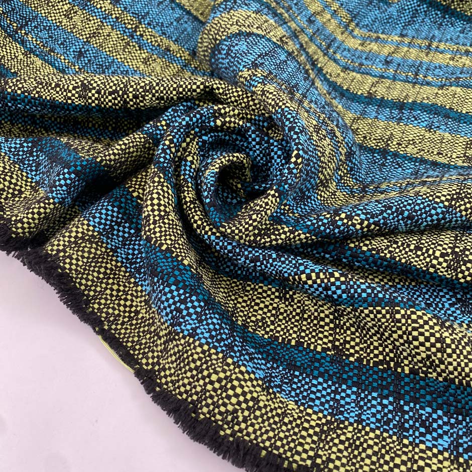 Viscose and polyester tweed in turquoise and lime yellow, shades maui blue and lima bean. Very soft, ideal for jackets dresses and skirts. High-quality deadstock collected in Stock from a Maison de Couture in Italy.