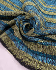 Viscose and polyester tweed in turquoise and lime yellow, shades maui blue and lima bean. Very soft, ideal for jackets dresses and skirts. High-quality deadstock collected in Stock from a Maison de Couture in Italy.