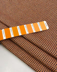 Cotton and polyester jacquard tweed, heavy, textured orange fabric. High quality deadstock fabric collected in Stock from a Maison de Couture in Italy.