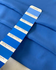 Silk and acetate crêpe de chine in light blue color reference Azure Blue. Very soft and light, flowy and not transparent. Ideal for shirting, blouses, dresses, and skirts. High-quality deadstock collected in Stock from a Maison de Couture in Italy.