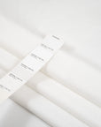 Lightweight and structured white cotton popeline. High-quality deadstock fabric collected in Stock from a Maison de Couture in Italy.