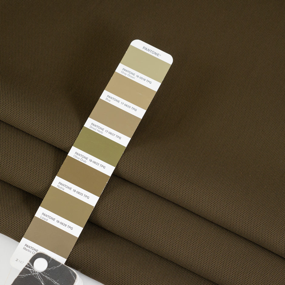 Green worked viscose cady falling and slightly elastic. High-quality deadstock fabric collected in Stock from a Maison de Couture in Italy. 