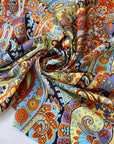 Polyester fabric with multicolor paisley design. Very soft, light and fluid. Ideal for dresses, blouses, skirts and shirting. High-quality deadstock collected in Stock from a Maison de Couture in Italy.